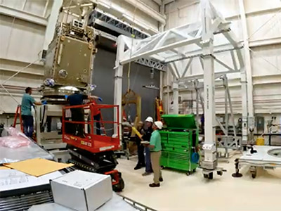Time-lapse video of lifting PACE Spacecraft SVU onto Aronson table, attaching Solar Array ETU, and lifting back to dolly at NASA Goddard Space Flight Center.
